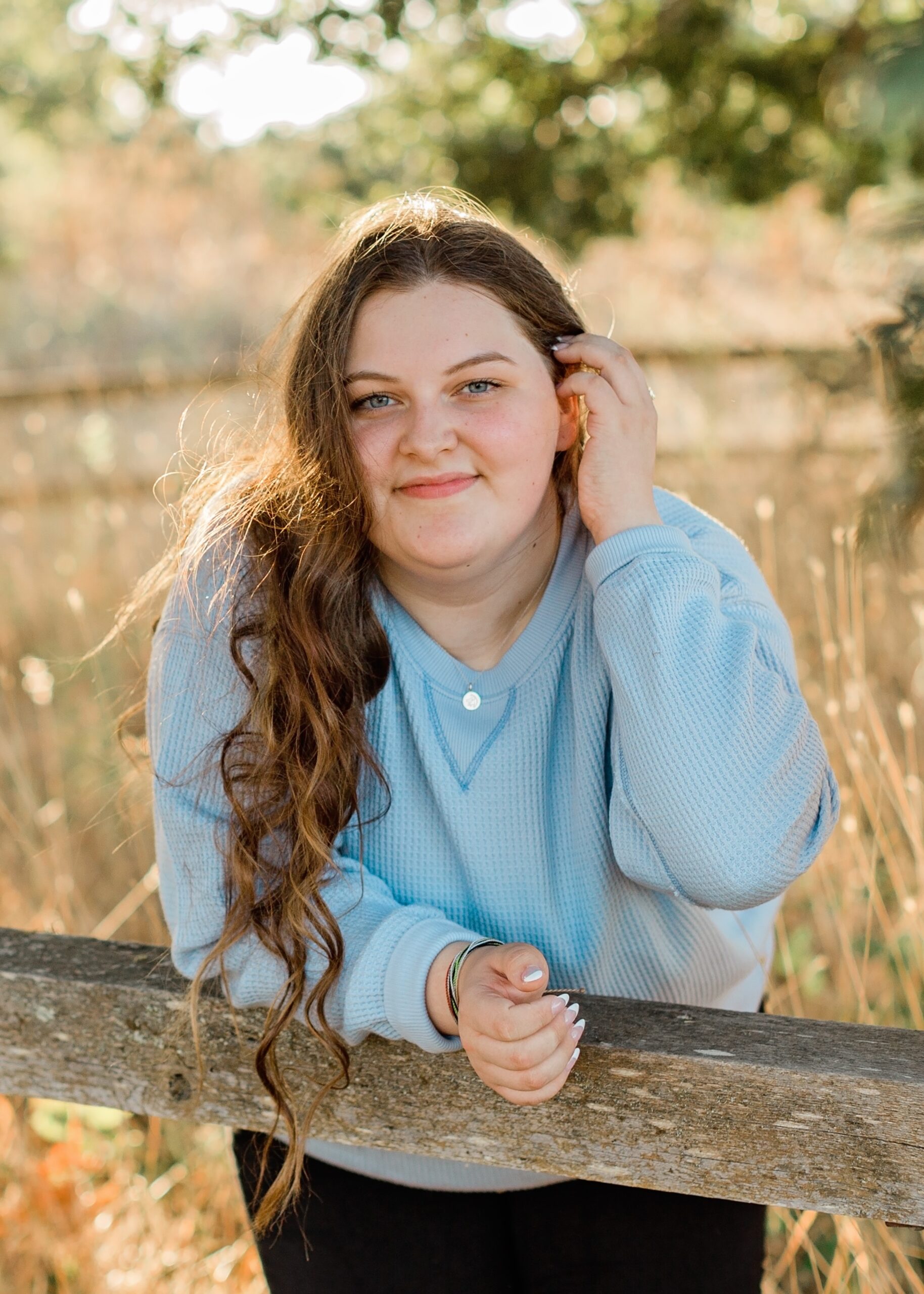Cayla, founder of Seven Lane, smiling outdoors